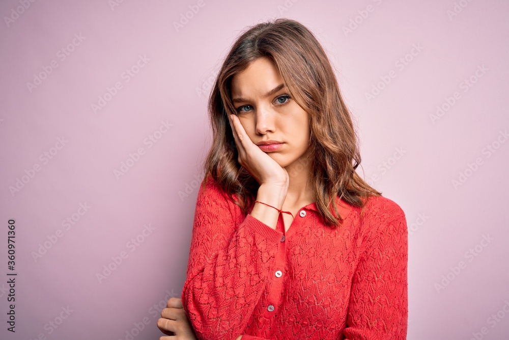 Young beautiful blonde casual girl over pink isolated background thinking looking tired and bored with depression problems with crossed arms. Young beautiful blonde casual girl over pink isolated background thinking looking tired and bored with depression problems with crossed arms.