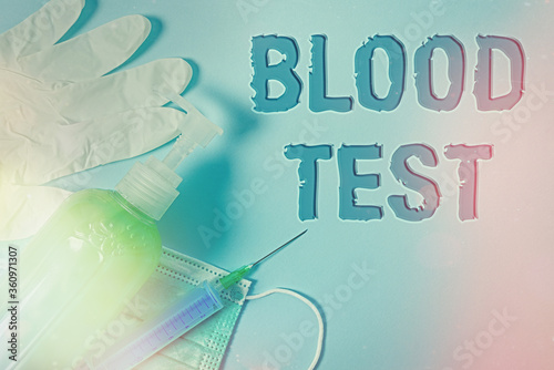 Conceptual hand writing showing Blood Test. Concept meaning Extracted blood sample from an organism to perfom a laboratory analysis Primary medical precautionary equipments health protection photo