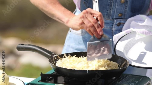 preparing potato rosti in a cooking pan
