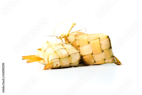 Ketupat, special dish served at Eid Mubarak / Ied Fitr celebration in Indonesia isolated on white background.