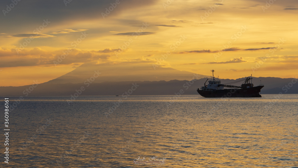 oil tanker at sunset