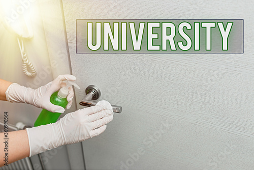 Handwriting text University. Conceptual photo an educational institution designed to teach and investigate Contamination within electronic gadgets sufaces controlled by disinfectant photo