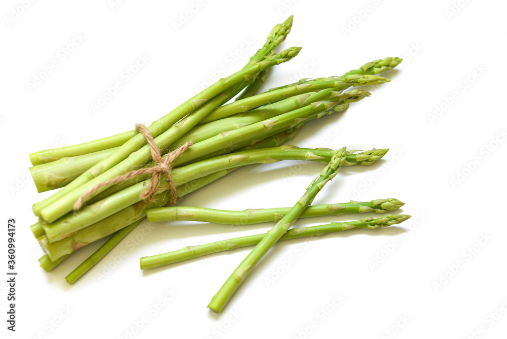 Asparagus isolated on white background - Fresh green asparagus Asparagus isolated on white background - Fresh green asparagus