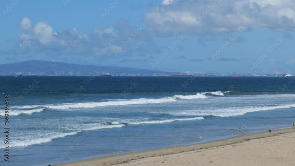 Waves rolling to shore at Huntington beach California
Waves rolling to shore at Huntington beach California