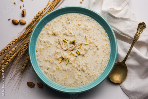 Daliya Kheer or Meetha Dalia is a delicious and healthy Indian Dessert made with broken or cracked wheat photo