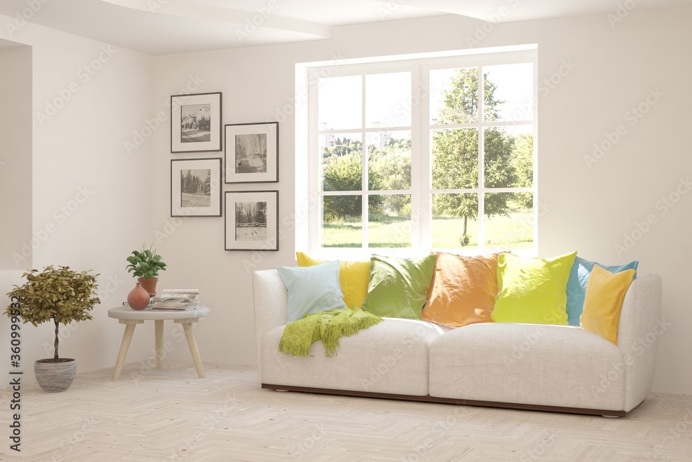 Fototapeta premium White living room with sofa and summer landscape in window. Scandinavian interior design. 3D illustration