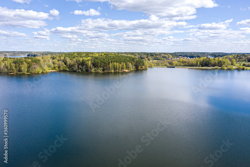 Fototapeta Naklejka Na Ścianę i Meble -  panoramic landscape of forest lake shore in summer sunny day. Vyacha lake, Belarus.