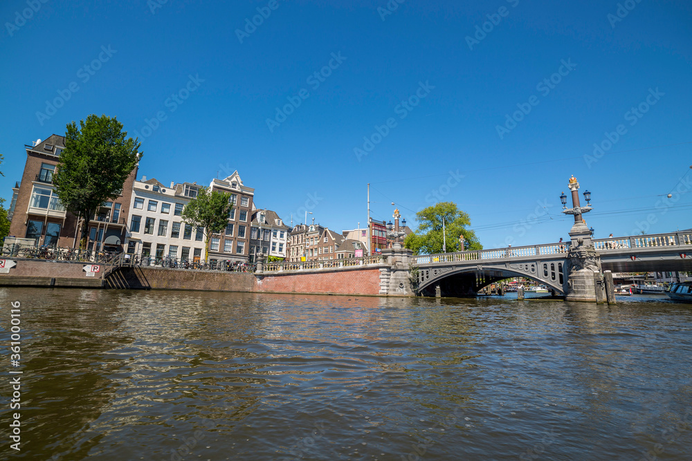 Bridge over the river channel in the center of Amsterdam