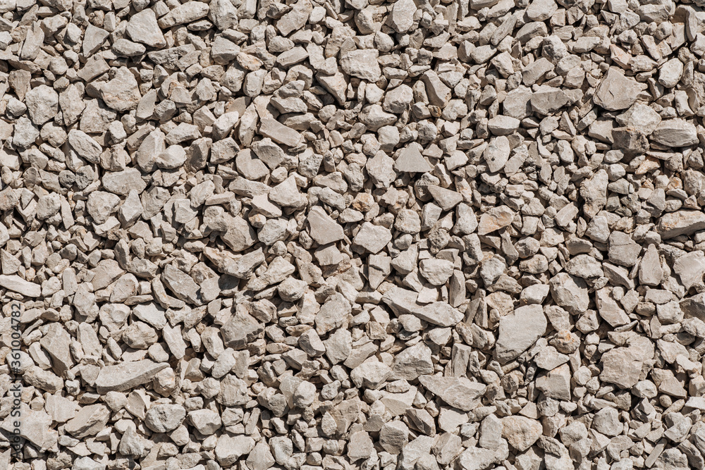 Background of gray crushed stone different forms Background of gray crushed stone different forms