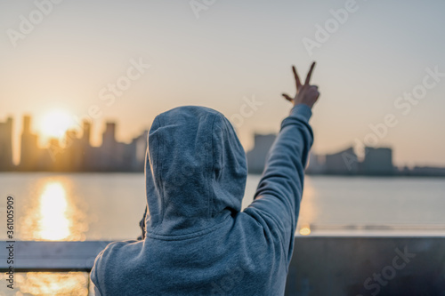 young woman with city skyline