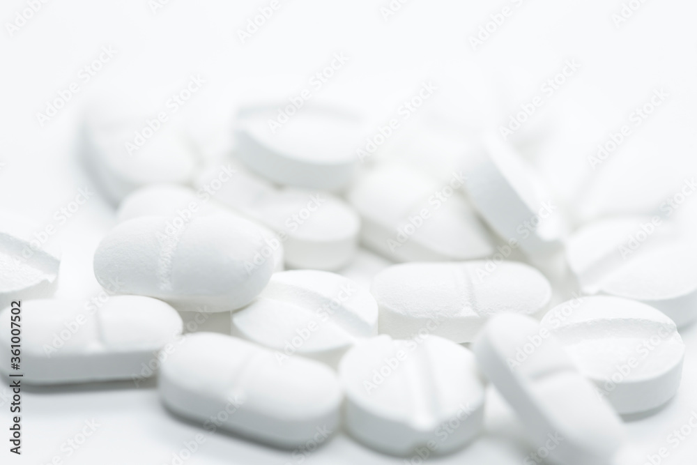 prescription pills on white background closeup