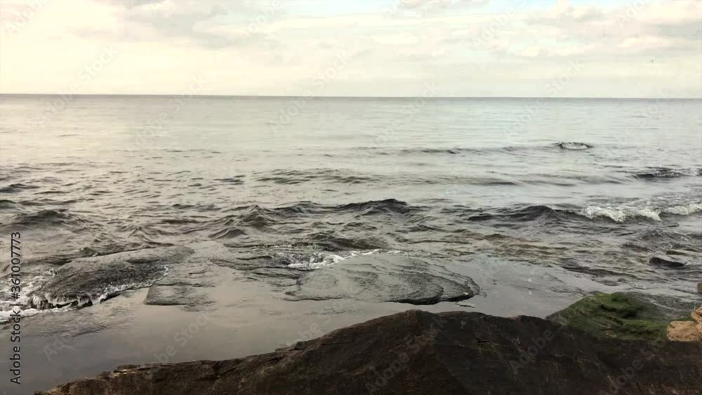 Time lapse of Lake Ontario taken from the shore of Oswego. Birds in the air Time lapse of Lake Ontario taken from the shore of Oswego. Birds in the air
