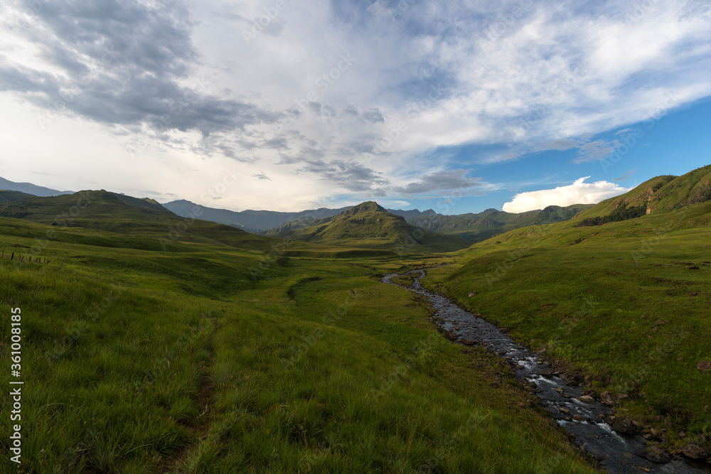 Green valley and mountain stream in Drakensberg
