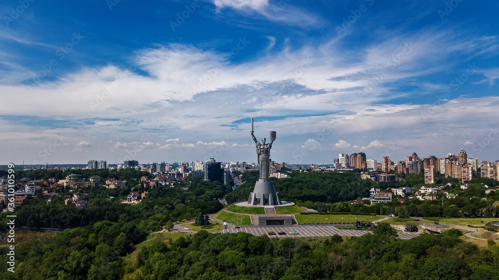Fototapeta premium Aerial drone view of Kyiv city hills and parks from above, Kiev cityscape and skyline in spring, Ukraine 