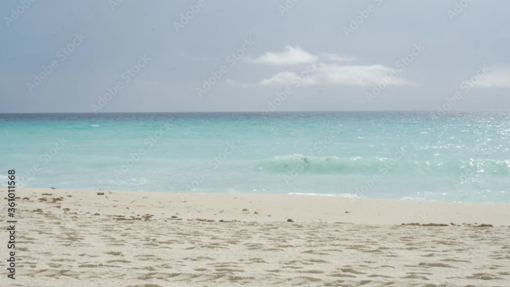 Calm Sea Waves in Cancun with beautiful blue waters. Caribbean Beach. Calm Sea Waves in Cancun with beautiful blue waters. Caribbean Beach.