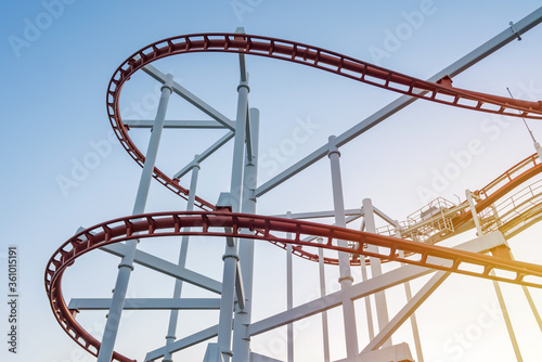 Fototapeta Naklejka Na Ścianę i Meble -  tracks of Roller coaster against blue sky, Perspective Concept