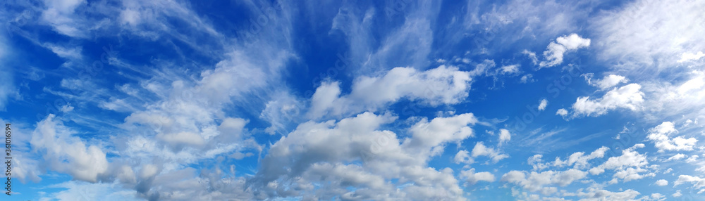 Panorama sky with beautiful cloud on a sunny day. Panoramic high resolution image. Panorama sky with beautiful cloud on a sunny day. Panoramic high resolution image.