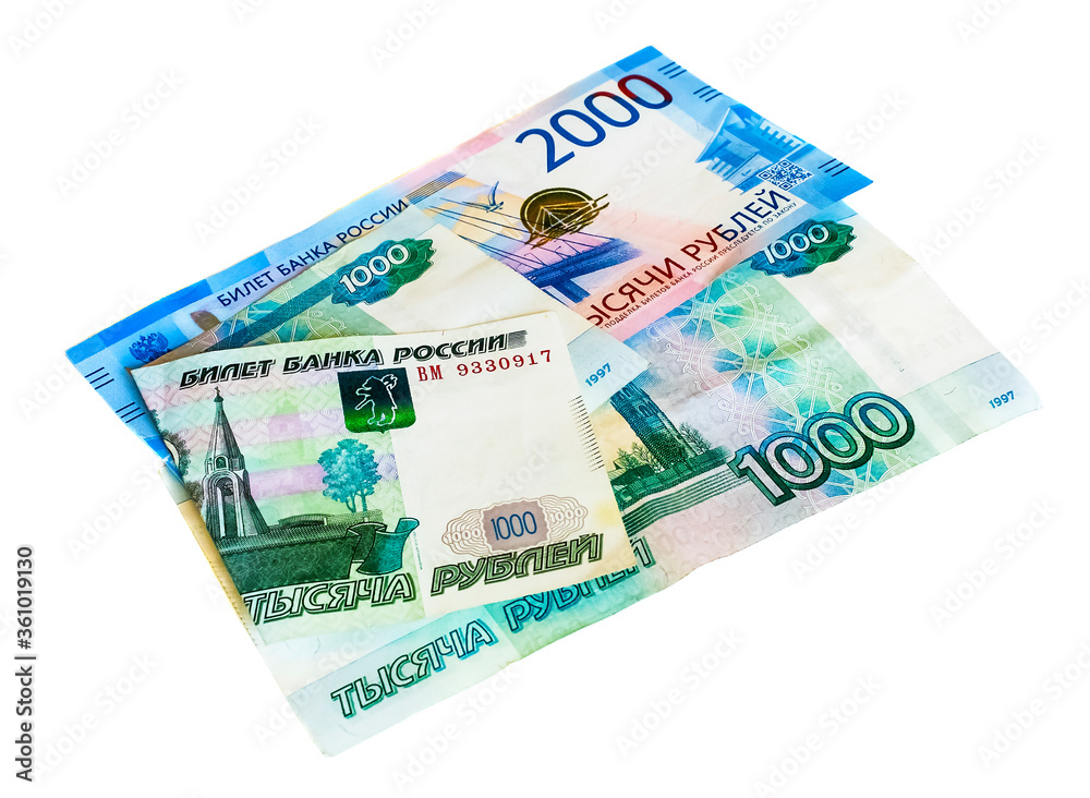 Russian paper money of different denominations on an isolated background Russian paper money of different denominations on an isolated background