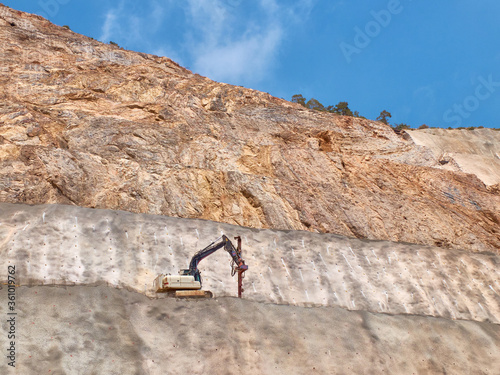 Drilling rig on the quarry sledge. Blasthole drilling operations