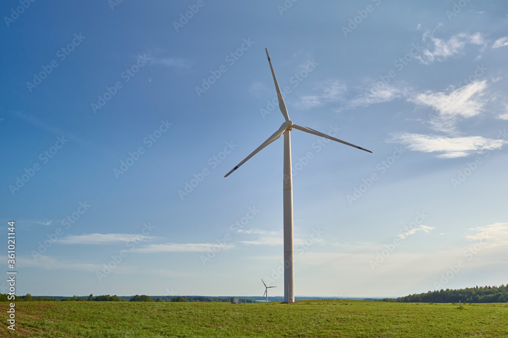 Wind turbine in the field. Wind power energy concept