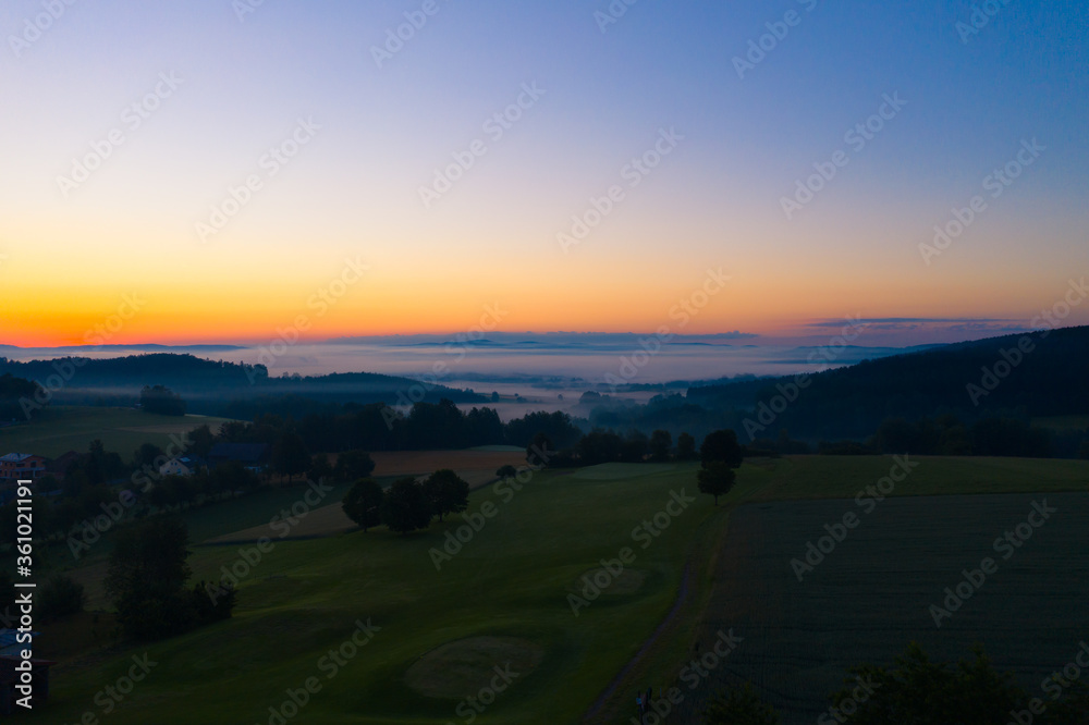 Drone panorama photo - dawn with early fog at blue hour