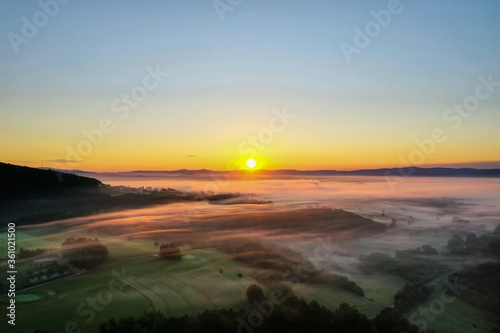 dreamlike sunrise after the rain - morning fog like cotton candy © Himmelreich Photo