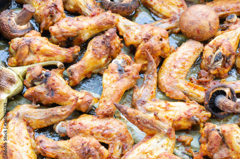 Oven - baked chicken wings with mushrooms Oven - baked chicken wings with mushrooms