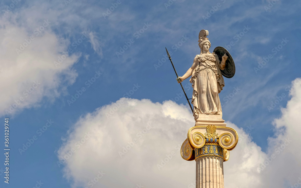 Athena marble statue on Ionic column and partly cloudy sky, space for text