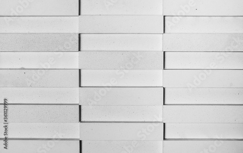 Arrange the rough brick with a slit. White and black.