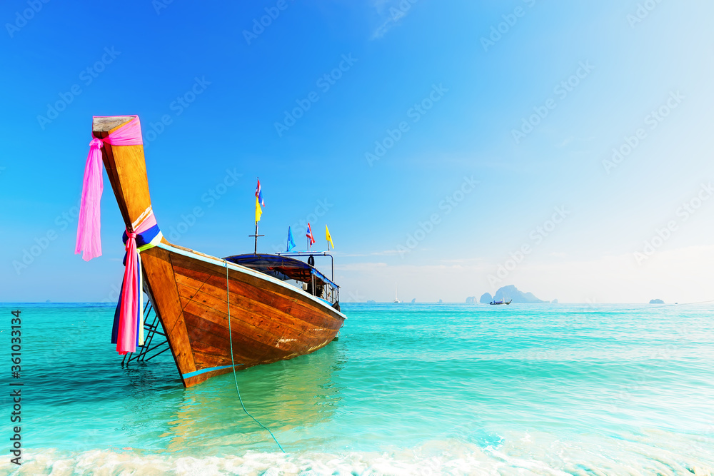 Long boat and tropical beach.