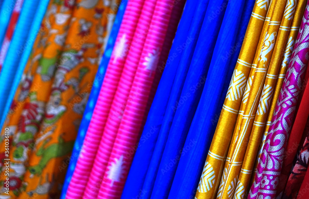 Φωτογραφία Close-up of Indian woman sarees or saris in display of retail shop
