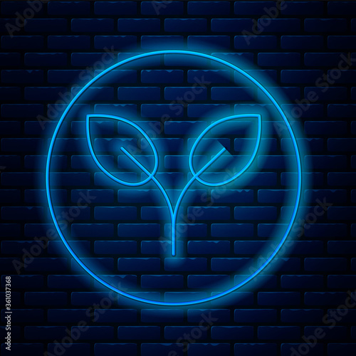 Glowing neon line Bio fuel icon isolated on brick wall background. Eco bio. Green environment and recycle. Vector Illustration.