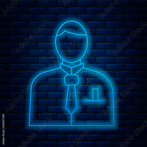 Glowing neon line Businessman or stock market trader icon isolated on brick wall background. Vector Illustration.