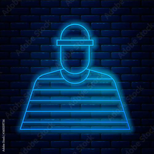 Glowing neon line Prisoner icon isolated on brick wall background. Vector Illustration.