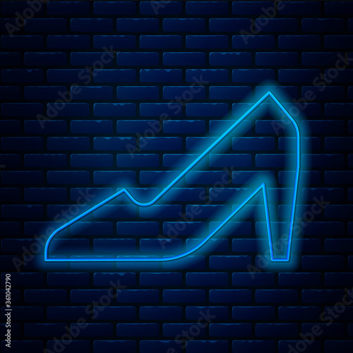 Glowing neon line Woman shoe with high heel icon isolated on brick wall background. 8 March. International Happy Women Day. Vector Illustration.