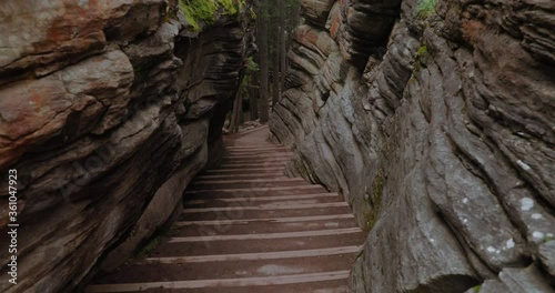 Beautiful staircase carved in the middle of a rock cravas at the Athabasca Falls lookout in Jasper National Park, Alberta, Canada. photo