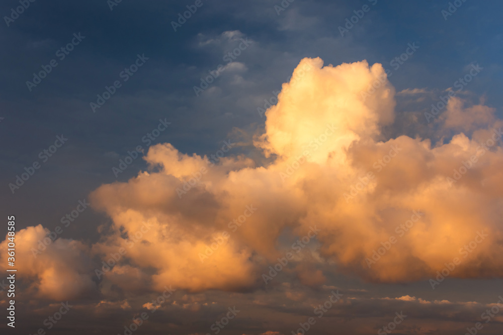 Huge Cumulus clouds in the sky. Pre-thunderstorm atmospheric condition. Summer natural background with white clouds.
