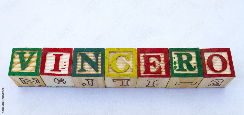 The term vincero displayed visually on a clear background using colorful wooden blocks image with copy space