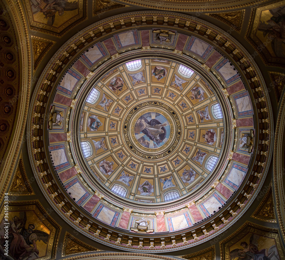 Dome of Catholic Cathedral inside with painting mural and frescoes, Budapest.