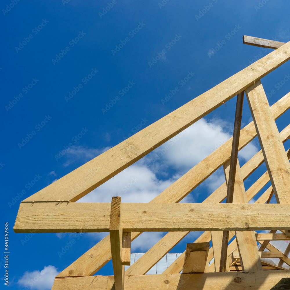 New Home Construction Under Blue Sky, symbolic photo for home, house building New Home Construction Under Blue Sky, symbolic photo for home, house building