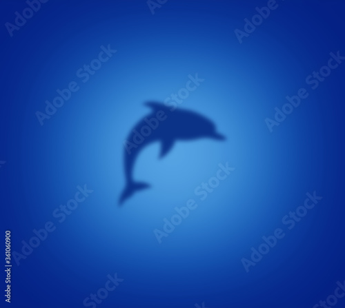 Dolphin silhouette on blue