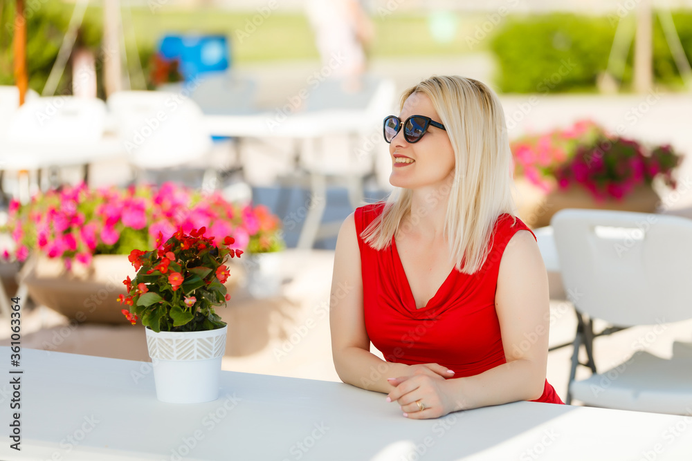 Closeup on beautiful calm woman enjoying nature on terrace in luxury cottage, spa resort, zen balance, summer vacation, harmony conception Closeup on beautiful calm woman enjoying nature on terrace in luxury cottage, spa resort, zen balance, summer vacation, harmony conception