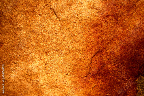 ancient red yellow granite stone surface of cave for interior