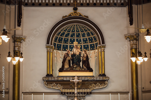 Mary, Jesus, St. Catherine and St. Dominic statue in Holy Rosary Church or Kalawar Church, Samphanthawong District, Bangkok, Thailand photo