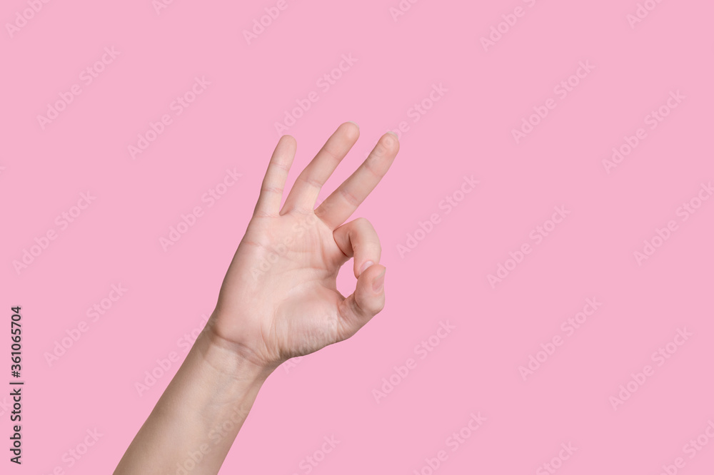 Close up hand showing ok gesture isolated Close up hand showing ok gesture isolated