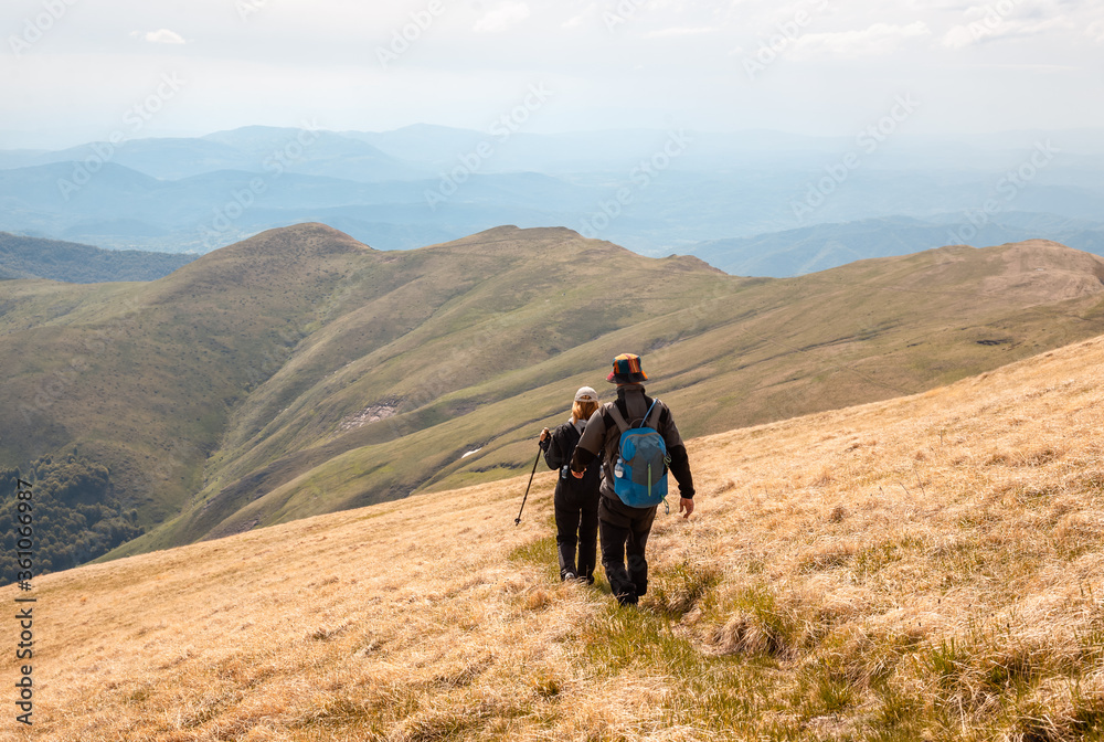 People hiking in mountain People hiking in mountain