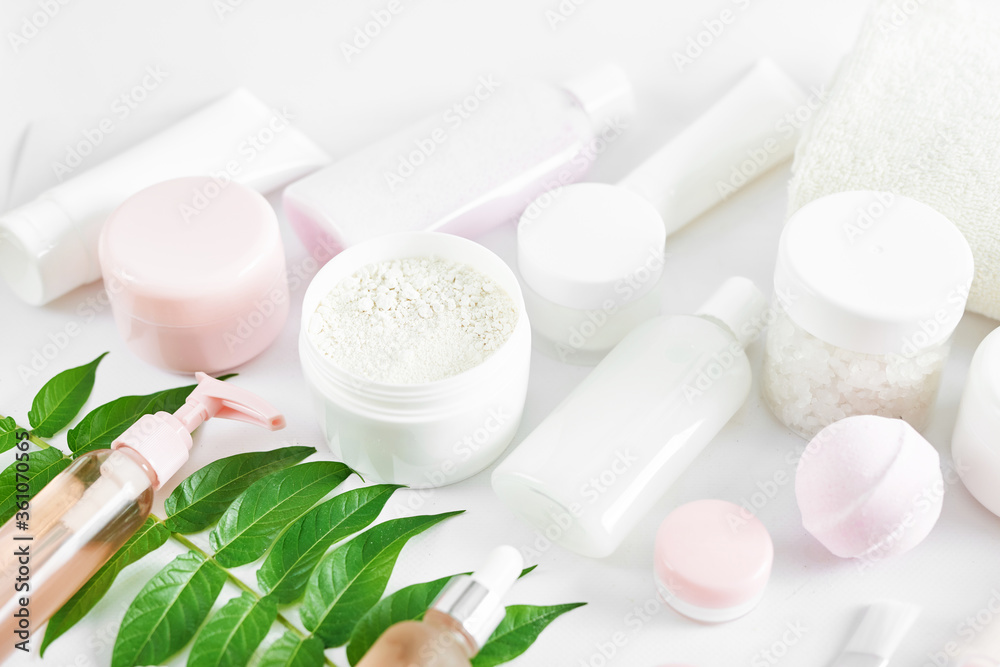 Flat lay composition Natural cosmetics ingredients for skincare, body and hair care.Top view bottles with facial treatment product white background. Makeup Layout. Set of traditional spa products. Flat lay composition Natural cosmetics ingredients for skincare, body and hair care.Top view bottles with facial treatment product white background. Makeup Layout. Set of traditional spa products.