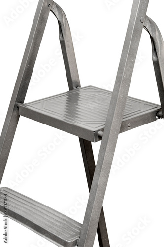 Upper steps of a gray stepladder on an isolated white background. Stairs.