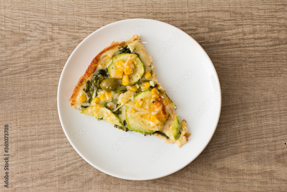 Food plate of pizza. Dish showing italian typical recipe. On rustic wooden table. Food plate of pizza. Dish showing italian typical recipe. On rustic wooden table.