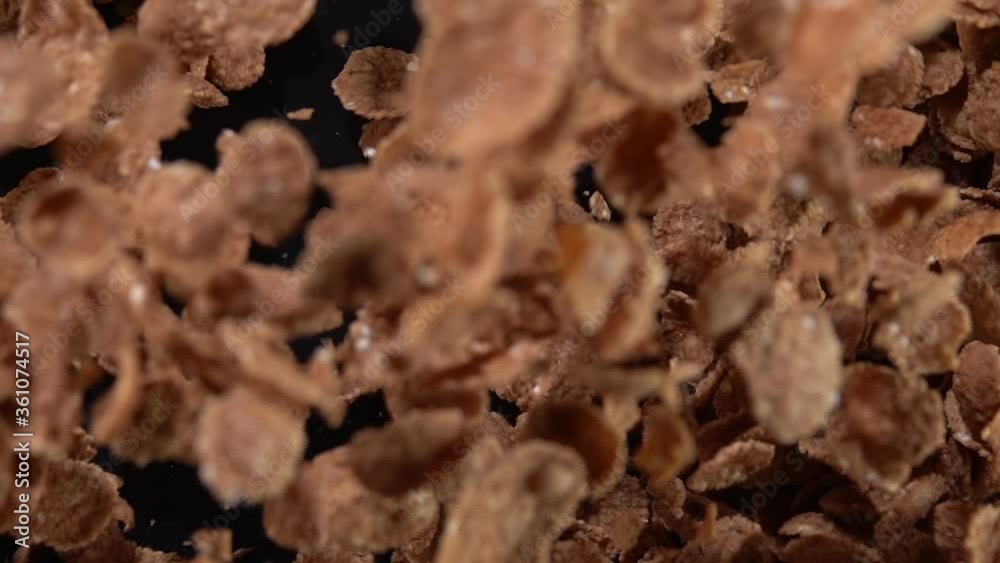 Explosion of wheat flakes on a black background. Slow motion 250 fps Explosion of wheat flakes on a black background. Slow motion 250 fps